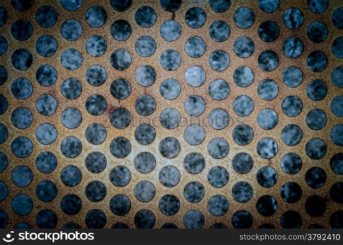 Old and rusty of mesh iron plate
