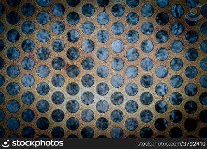 Old and rusty of mesh iron plate