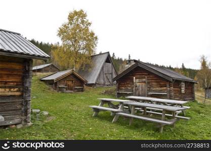 Old and traditional wooden cabins in mountain