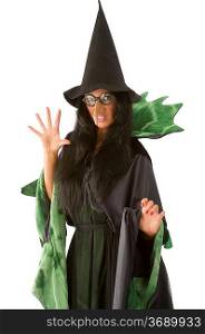 old and ugly witch in black and green dress with glasses