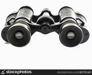 Old antique binoculars isolated over white background