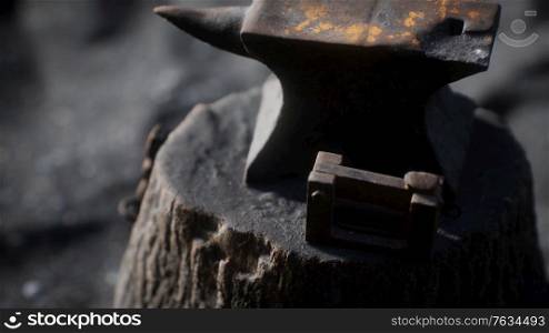 Old anvil attached to a stump