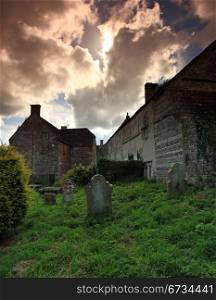 Old architecture and graveyard in cerne abbas dorset