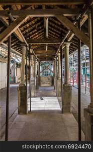 Old Architecture: Arcades inside a Gallery of Bolhao Market in Porto, Portugal