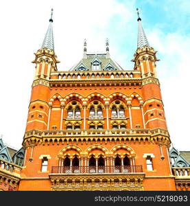 old architecture in london england windows and brick exterior wall