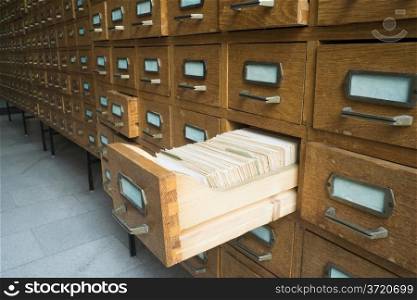 Old archive with wooden drawers