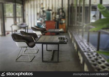 Old arm chairs and wooden table interior, stock photo