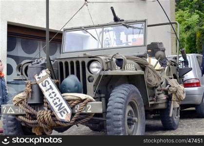 "Old armored vehicle of the Second World War, the jeep with machine gun in the historical pageant "the column of liberation""