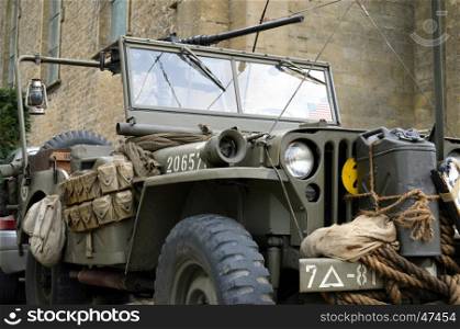"Old armored vehicle of the Second World War, the jeep with machine gun in the historical pageant "the column of liberation""