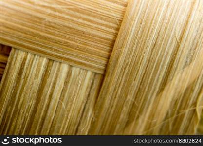 Old bamboo weave mat texture close up single focus. Old bamboo weave mat texture close up single focus photo