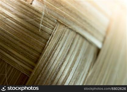 Old bamboo weave mat texture close up single focus. Old bamboo weave mat texture close up single focus photo