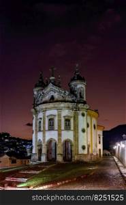 Old baroque church illuminated at dusk in the historic town of Ouro Preto in Minas Gerais. Old baroque church illuminated at dusk in Ouro Preto