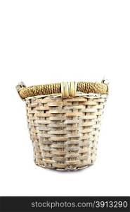 Old basket made of reed isolated on white background