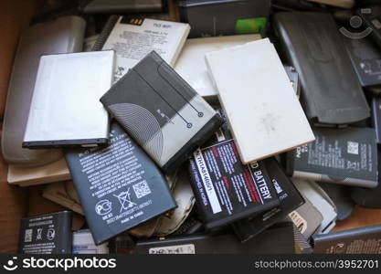 old batteries from mobile phones close-up