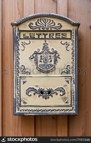 old beautifully decorated post box with the inscription in french language lettres in english letters