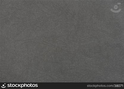 Old black paper texture background. Seamless kraft paper texture background. Close-up paper texture using for background. Paper texture background with soft pattern. Highly detailed paper background.