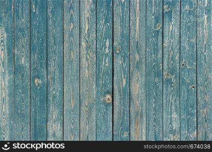old blue painted vertical wooden planks, background, texture. blue painted wooden planks, background, texture