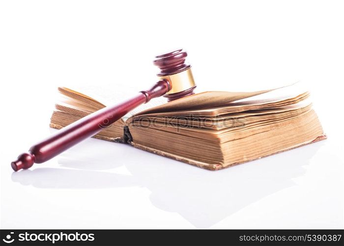 Old book and wooden gavel - jastice concept
