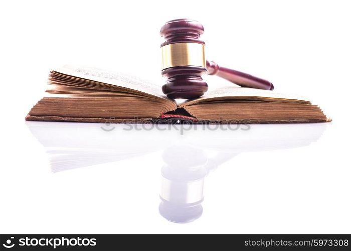 Old book and wooden gavel - jastice concept. Book and gavel