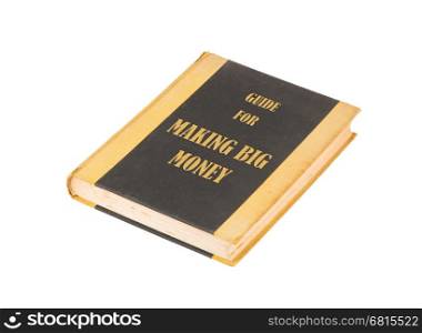 Old book with a making big money concept title, white background