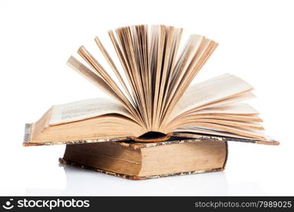 old books on white background. Vintage books