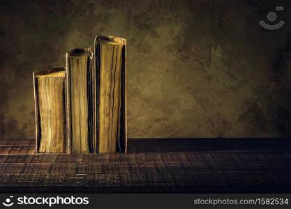 old books vintage on wood floor and paper aged background or texture.