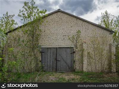 Old brick abandoned barn
