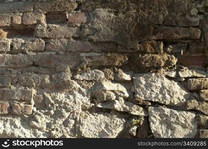 Old brick and stones wall. Close up