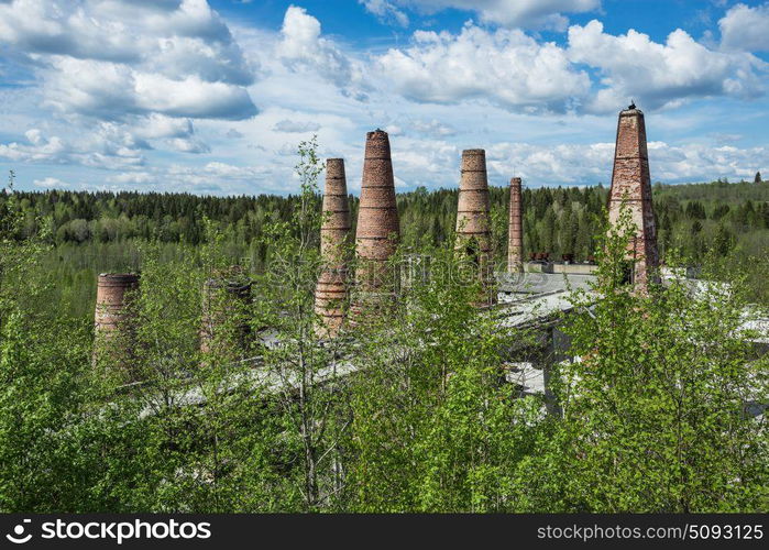 Old brick pipes of abandoned marble factory in Ruskeala, Karelia republic, Russia