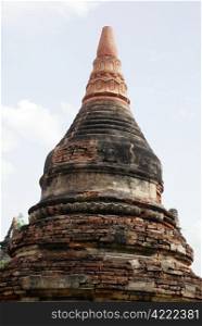 Old brick stupa with new top in Inwa, Myanmar