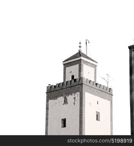 old brick tower in morocco africa village and the sky