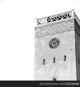 old brick tower in morocco africa village and the sky