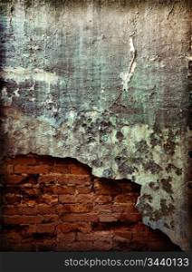 old brick wall with cracked stucco layer background