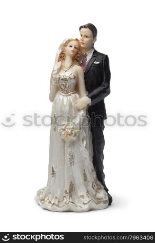 Old bride and groom cake topper on white background