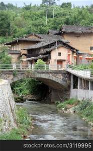 Old bridge in chinese village, China