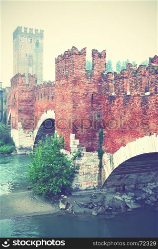 Old bridge in Verona, Italy. Retro style filtred image