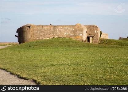 Old broken German bunkers of Atlantic Wall and artillery battery of Longues sur Mer