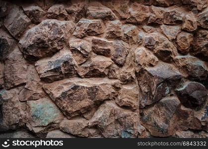 Old brown stones wall pattern, useful as background