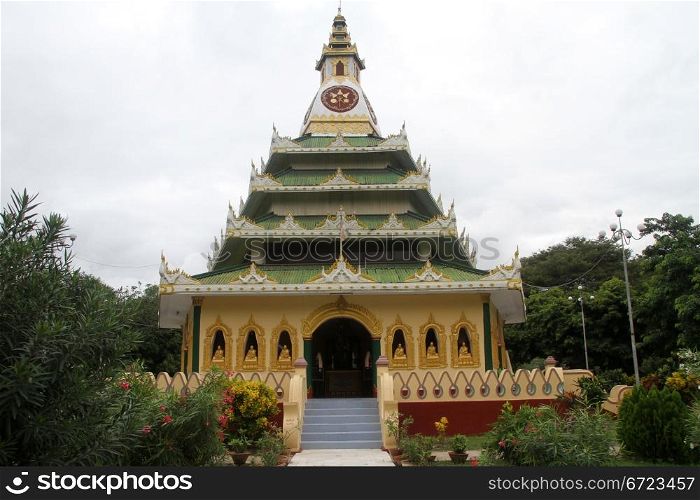 Old buddhist temple with green roofs in Mingun, Mandalay, Myanmar
