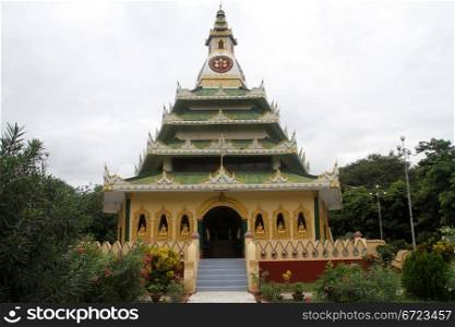 Old buddhist temple with green roofs in Mingun, Mandalay, Myanmar