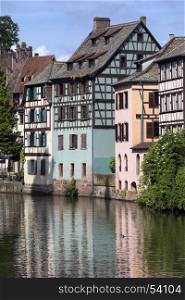 Old buildings in the historic Little Venice area of the city of Strasbourg in the Alsace region of France. This area of the city is a UNESCO World Heritage Site.