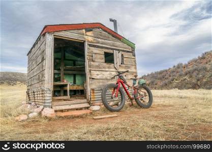old cabin in Rocky Mountains and a fat bike - Red Mountain Open Space near Fort Collins, Colorado