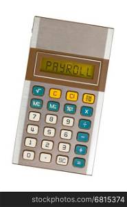 Old calculator showing a text on display - payroll