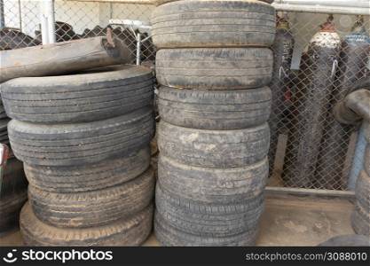 Old car tires. Concept. Danger of traveling by car.