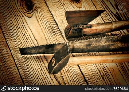 Old carpentry tools on a wooden background. carpentry tools on a wooden background