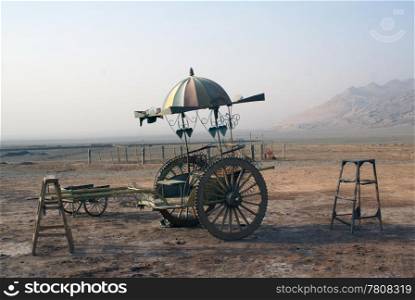 Old cart in desert near Turphan