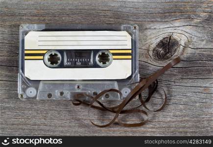 Old Cassette Tape Cartridge on rustic wood