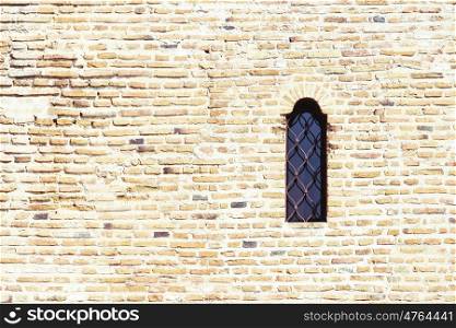 Old Castle Window On Brick Wall
