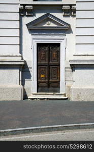 old castronno abstract in italy the old wall and church door