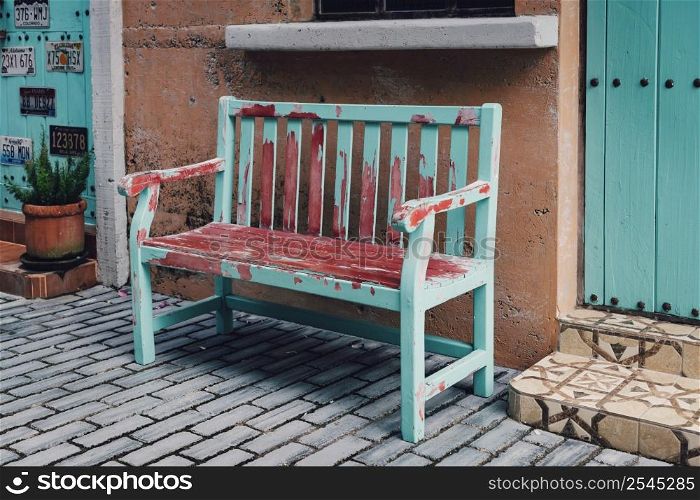 Old chair in outdoor and front of house wall background
